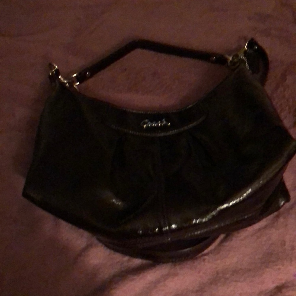 Like-new dark brown patent leather purse.